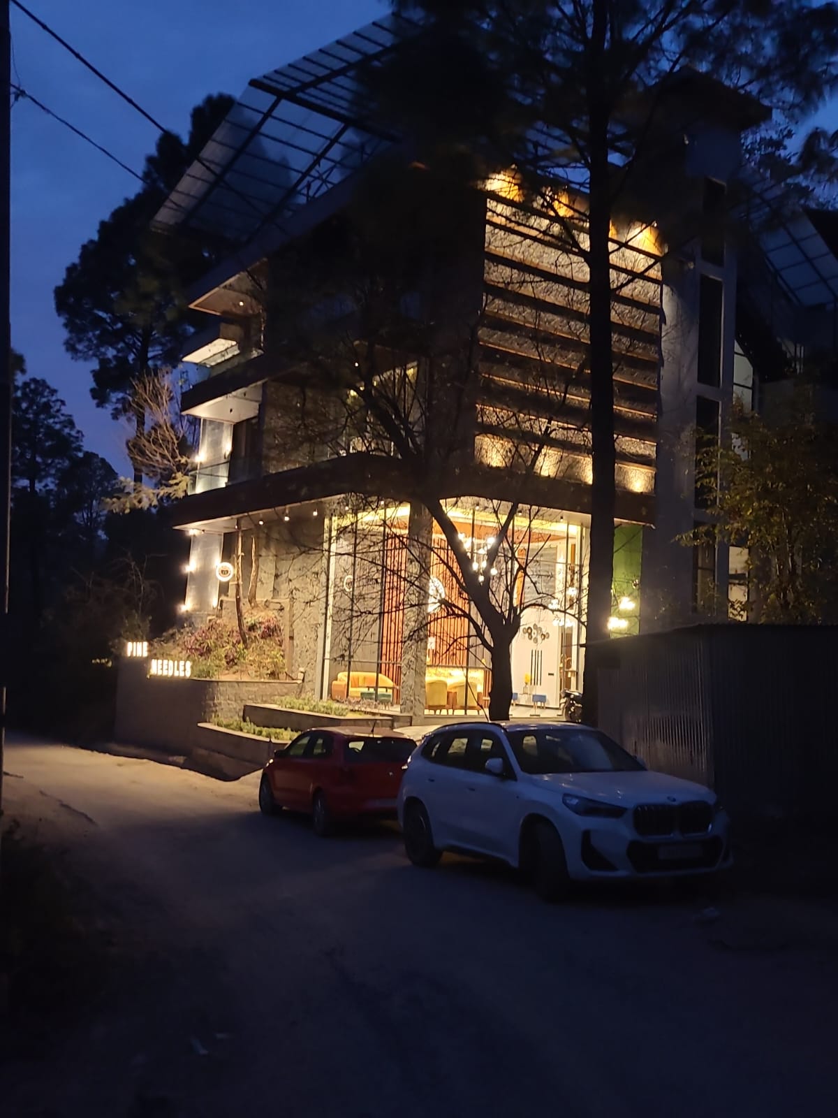 Handcrafted bedroom with linen bedding and forest view